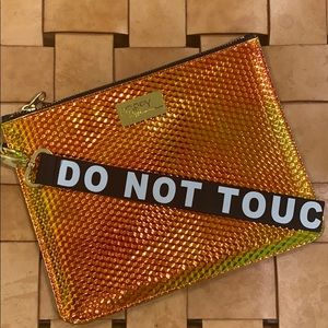 Poppy Lissiman hologram clutch